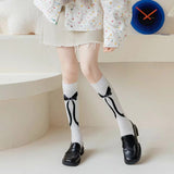 ミルキームード_秋冬 ガーリーリボン モノトーン ロングニーハイソックス