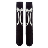 ミルキームード_秋冬 ガーリーリボン モノトーン ロングニーハイソックス