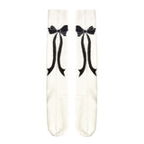 ミルキームード_秋冬 ガーリーリボン モノトーン ロングニーハイソックス